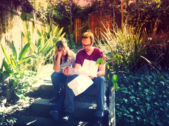 Kasi Brown and Brandon Walter go over the shot list between set ups.